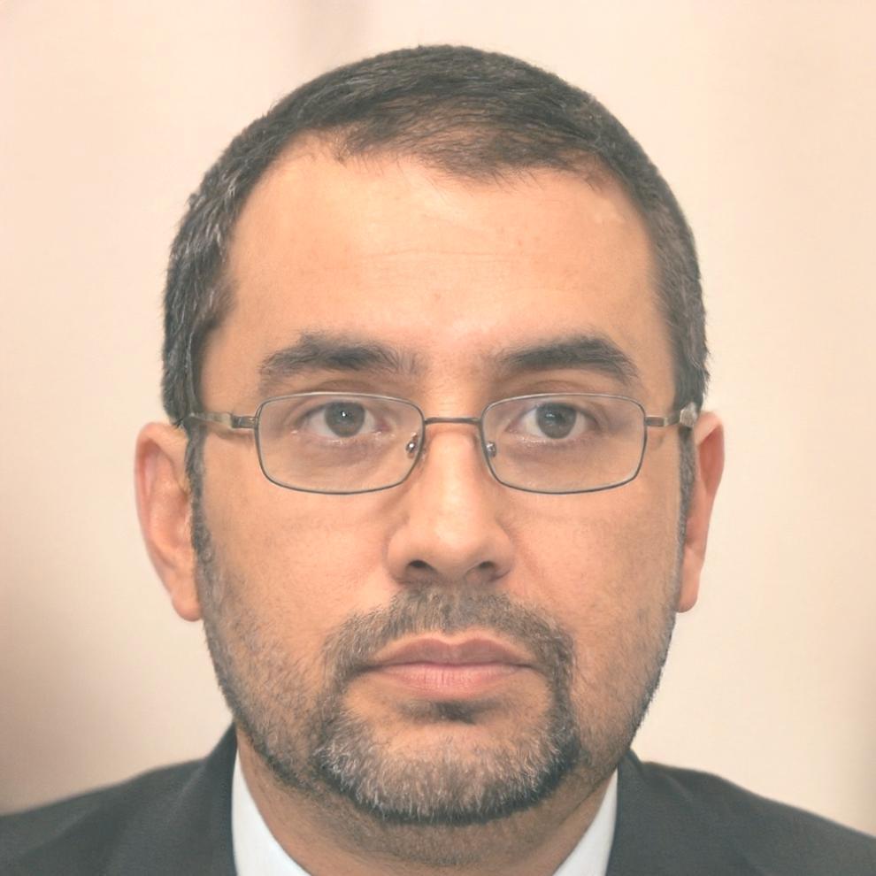 Dr. Carlos Mendoza, Director de Programas Financieros